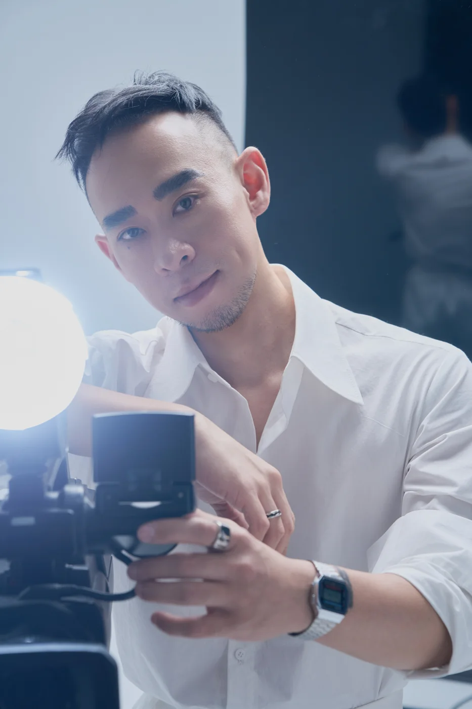 Kane working behind a camera